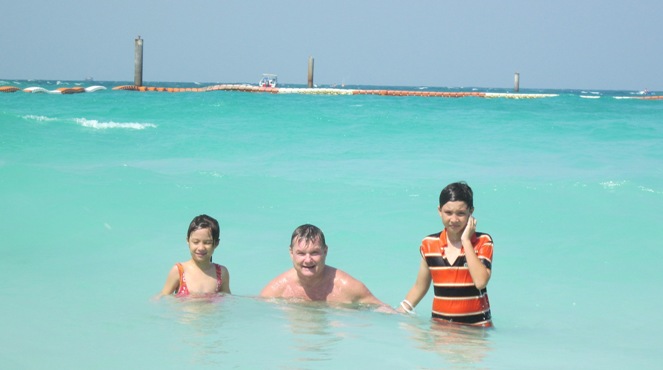 In the clear blue sea at Koh Larn Beach, Thailand, January 2012, it beats shoveling snow.